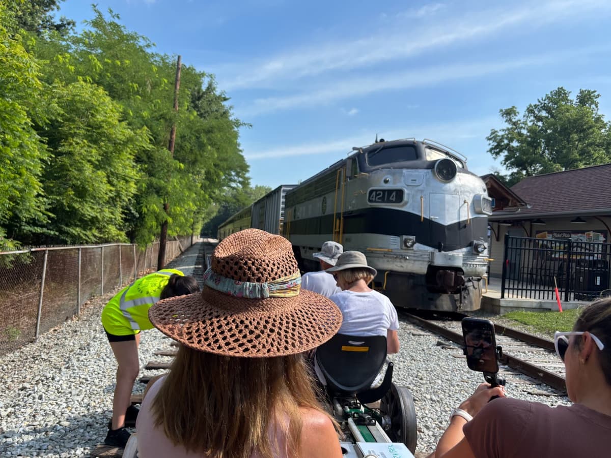View of railbikes on the railroad track preparing to start peddling.